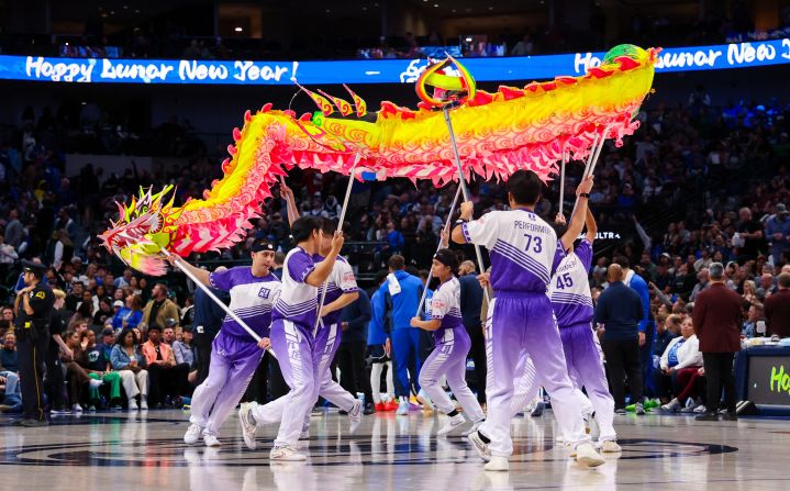 Dallas Mavericks celebrate the Lunar New Year with performers during the game against the Oklahoma City Thunder at American Airlines Center on February 10, in Dallas, Texas.