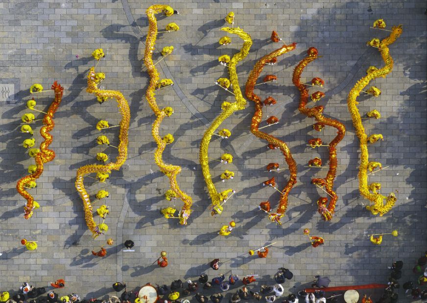 Aerial view of folk artists performing dragon dance on February 11, in Huaian, China.