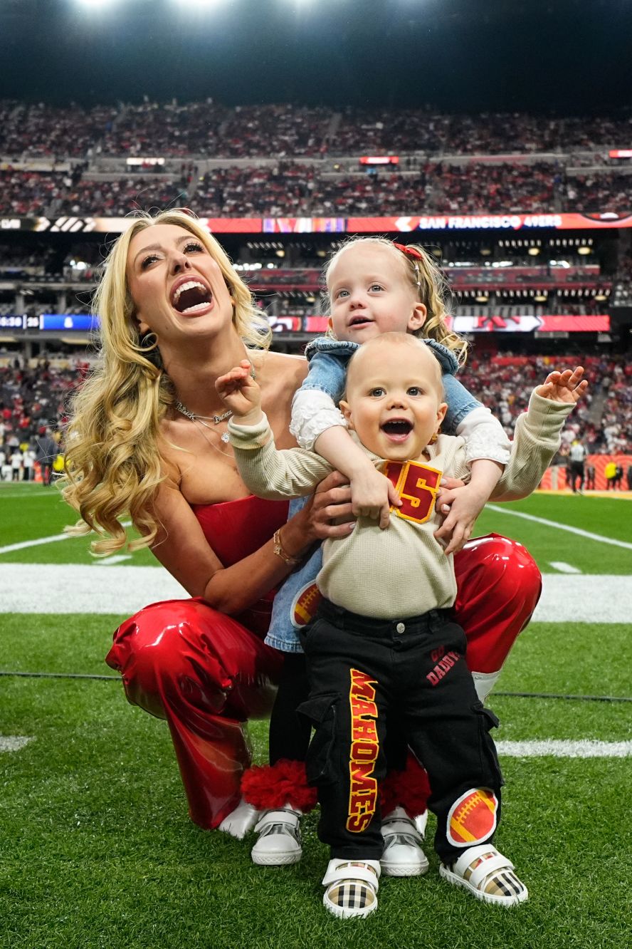 Mahomes' wife, Brittany, poses for a photo with their children, Sterling and Bronze, before the game.