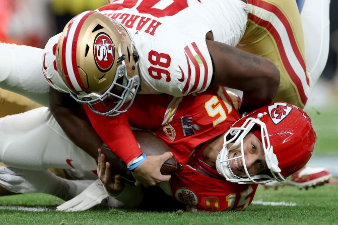 49ers defensive lineman Javon Hargrave covers up Mahomes. Mahomes was frequently under pressure in the first half, and the 49ers sacked him twice.