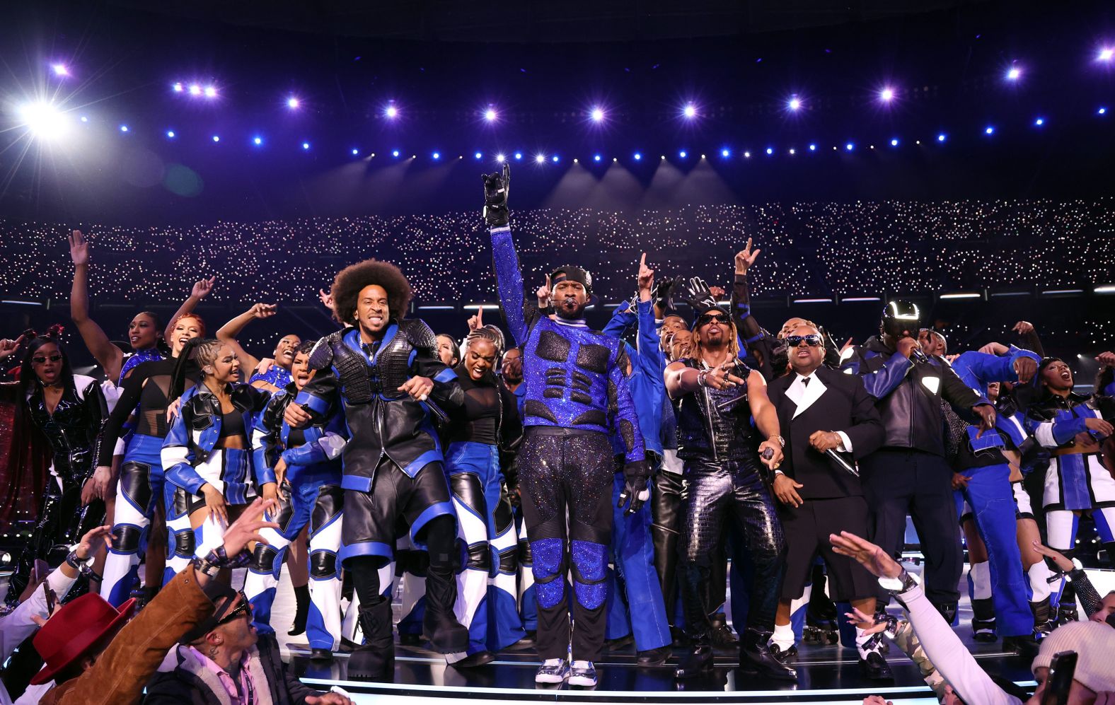 Usher, center, and his fellow performers close out the show.