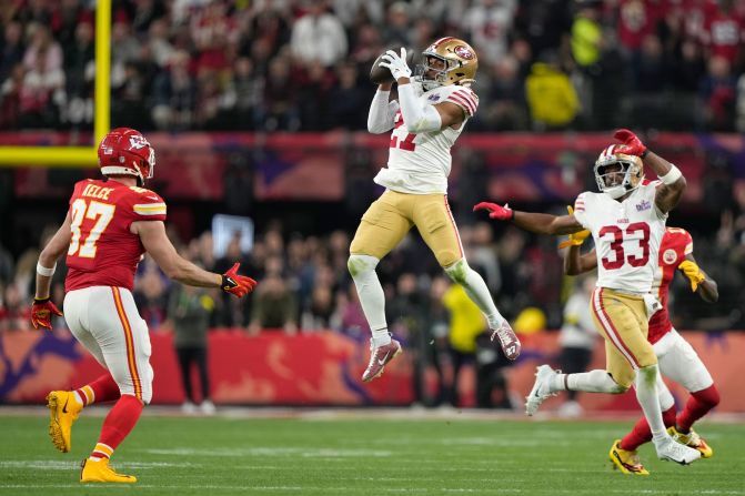 49ers safety Ji'Ayir Brown intercepts a Mahomes pass on the opening drive of the second half.
