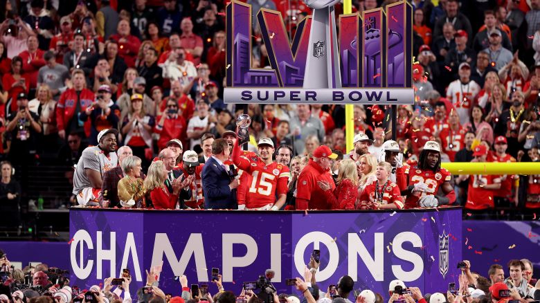 LAS VEGAS, NEVADA - FEBRUARY 11: Patrick Mahomes #15 of the Kansas City Chiefs holds the Lombardi Trophy after defeating the San Francisco 49ers 25-22 in overtime during Super Bowl LVIII at Allegiant Stadium on February 11, 2024 in Las Vegas, Nevada. (Photo by Steph Chambers/Getty Images)