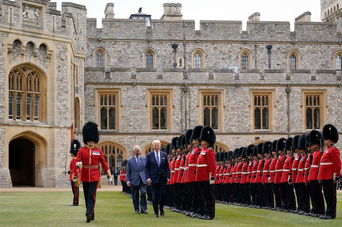 Biden reviews royal guards in front of Britain's King Charles III during a <a href="https://www.cnn.com/2023/07/10/politics/biden-london-king-charles-pm-sunak/index.html" target="_blank">welcoming ceremony</a> in Windsor, England, on July 10, 2023. It was Biden's second trip to Windsor Castle since taking office.
