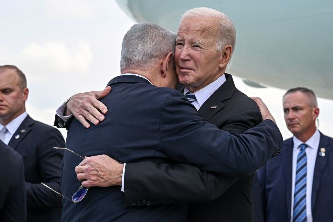 Biden, center right, is greeted by Israeli Prime Minister Benjamin Netanyahu after arriving at the Ben Gurion International Airport in Tel Aviv, Israel, on October 18, 2023. Biden capped his trip by <a href="index.php?page=&url=https%3A%2F%2Fwww.cnn.com%2F2023%2F10%2F18%2Fpolitics%2Fjoe-biden-israel-trip%2Findex.html" target="_blank">sending an emphatic message of support</a> to Israel, promising new aid to Netanyahu's government as it prepared fresh action against Hamas.