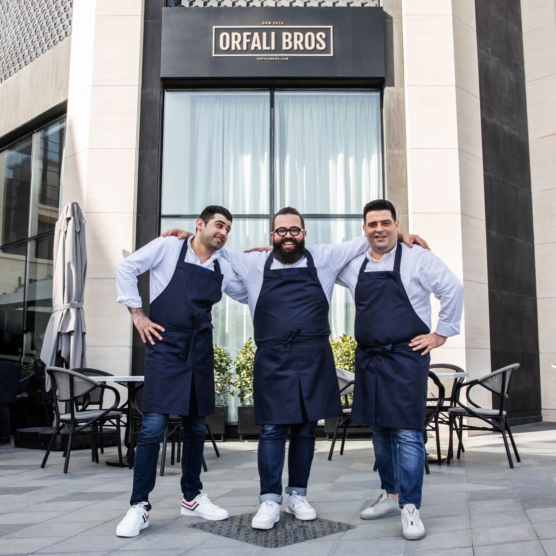 The Orfali brothers outside their restaurant
