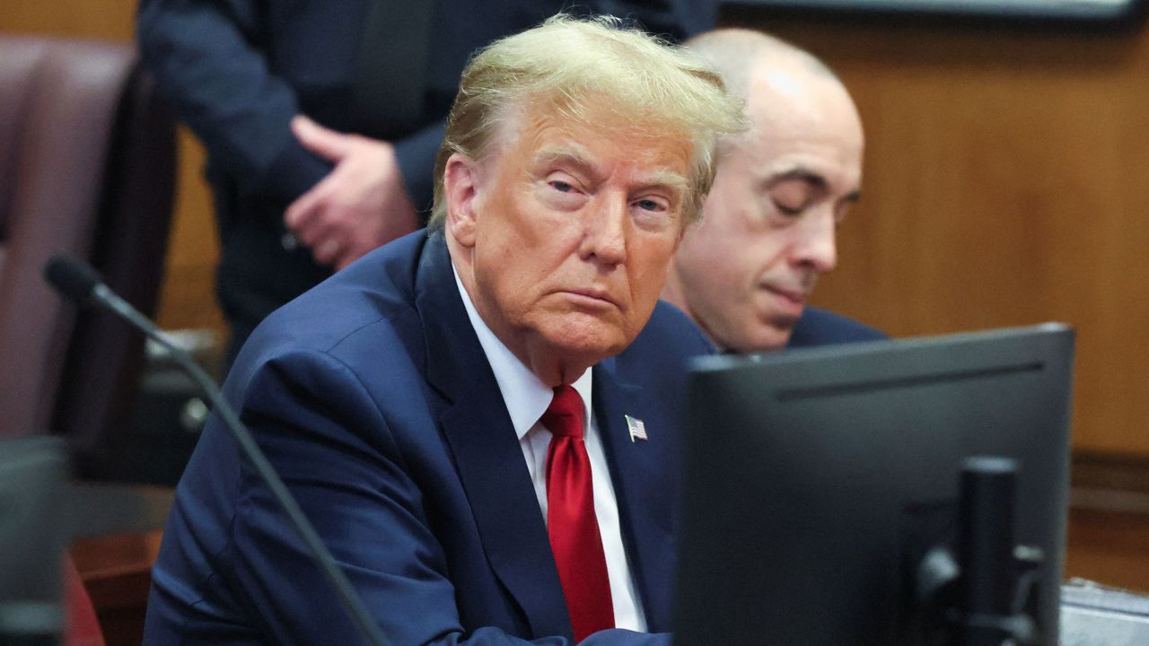 Former President Donald Trump appears during a court hearing on charges of falsifying business records to cover up a hush money payment to a porn star before the 2016 election, in Manhattan criminal court in New York on Thursday.