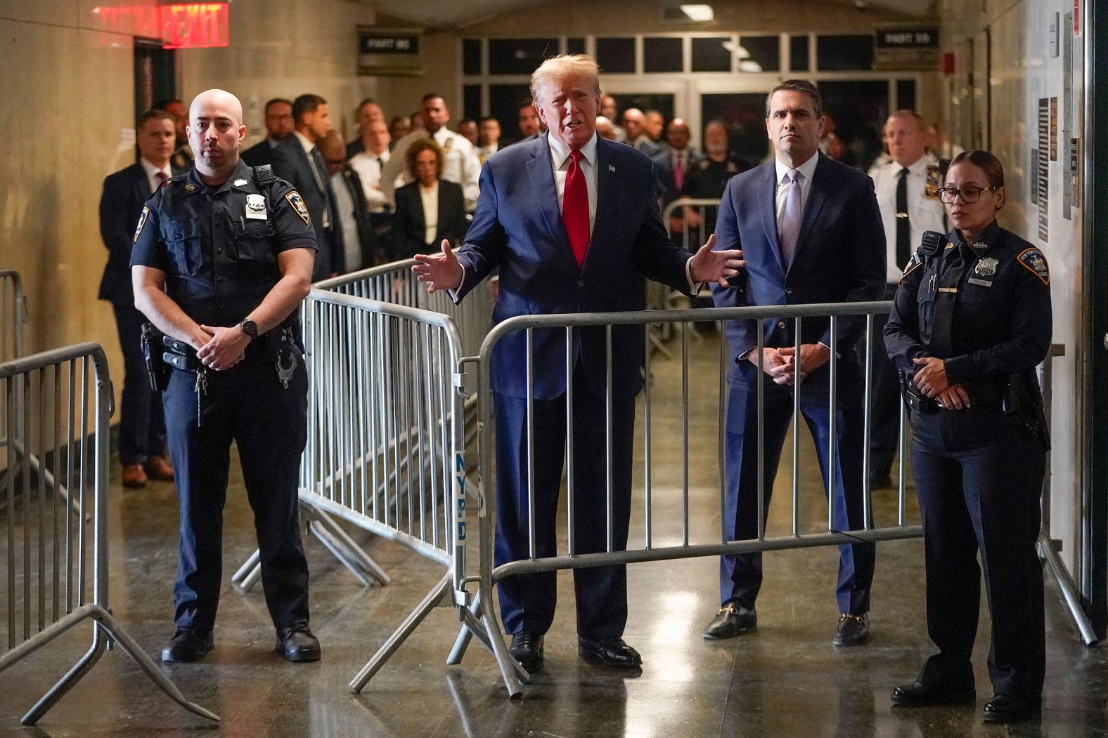 Trump speaks before entering the courtroom on February 15. "This is not a crime," <a href="index.php?page=&url=https%3A%2F%2Fwww.cnn.com%2Fpolitics%2Flive-news%2Ftrump-hearings-ny-georgia%2Fh_4e1d4ddd01b2853ca32b0036f2ca9ead" target="_blank">he told reporters in the courthouse hallway</a>. He added that he'd rather spend his time campaigning than in courtrooms: "We want delays, obviously I'm running for election."