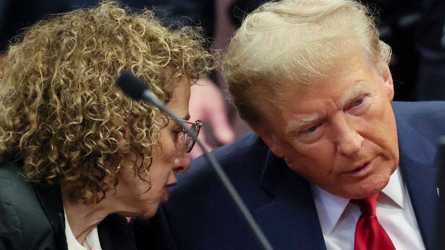 NEW YORK, NY - FEBRUARY 15: Republican presidential candidate, former U.S. President Donald Trump talks to attorney Susan Necheles during a pre-trial hearing at Manhattan Criminal Court on February 15, 2024 in New York City. Trump was charged with 34 counts of falsifying business records last year, which prosecutors say was an effort to hide a potential sex scandal, both before and after the 2016 presidential election. Judge Juan Manuel Merchan is expected to rule whether the trial will begin as scheduled on March 25. (Photo by Brendan McDermid-Pool/Getty Images)