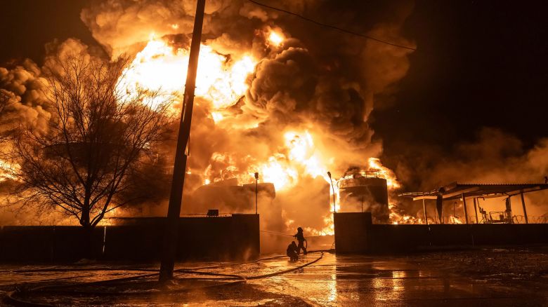 Firefighters extinguish a fire after a Russian attack on a residential neighborhood in Kharkiv, Ukraine on February 10, 2024. (AP Photo/Yevhen Titov)