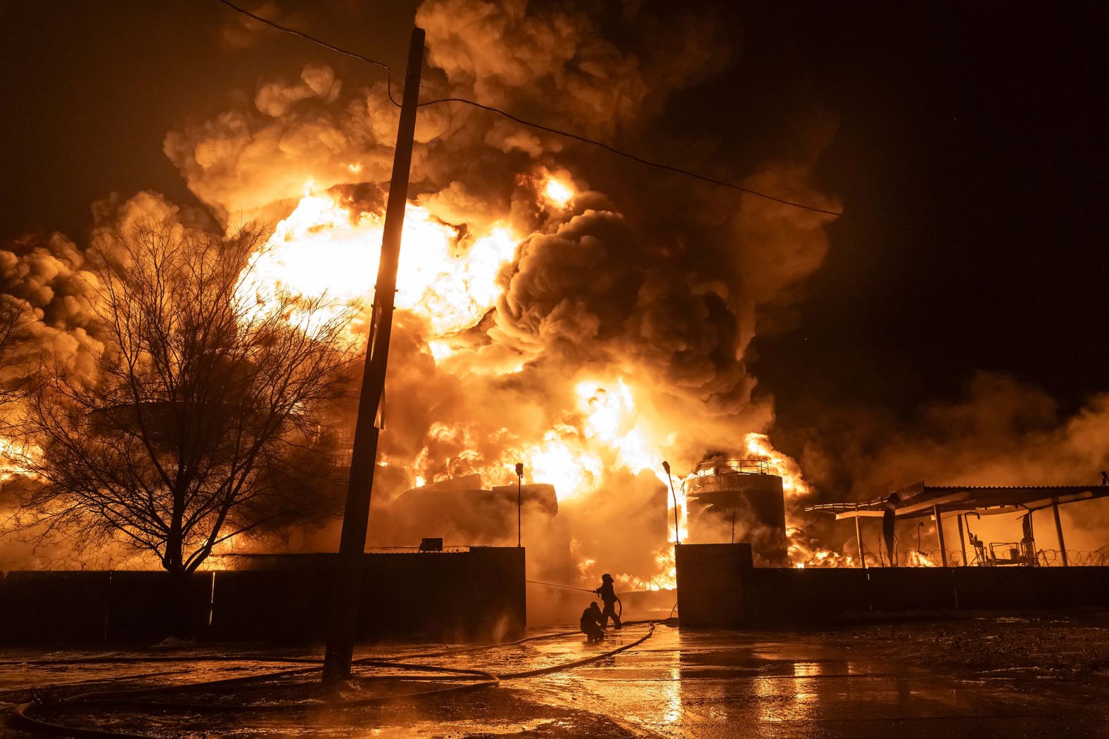 Firefighters in Kharkiv, Ukraine, extinguish flames in a residential neighborhood after a Russian attack on Saturday, February 10. It has been nearly two years since Russia invaded Ukraine, starting a war that continues today.