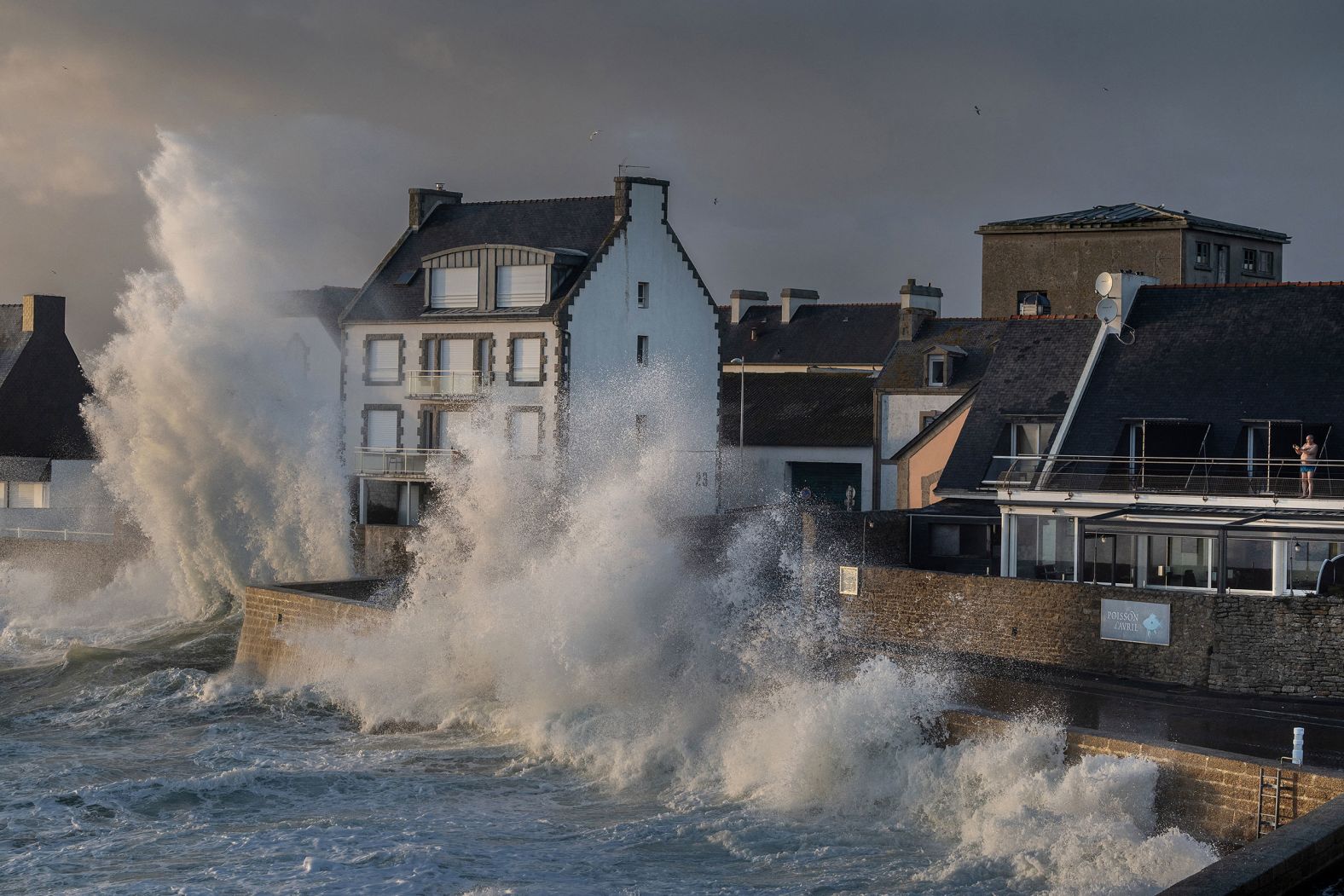 Waves hit the shore in the port of Le Guilvinec, France, on Saturday, February 10. A powerful storm was set to hit the area.