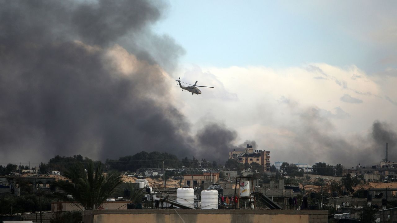 Israeli helicopter flies over Khan Younis, Gaza Strip, Thursday, Feb. 15, 2024. (AP Photo/Mohammed Dahman)