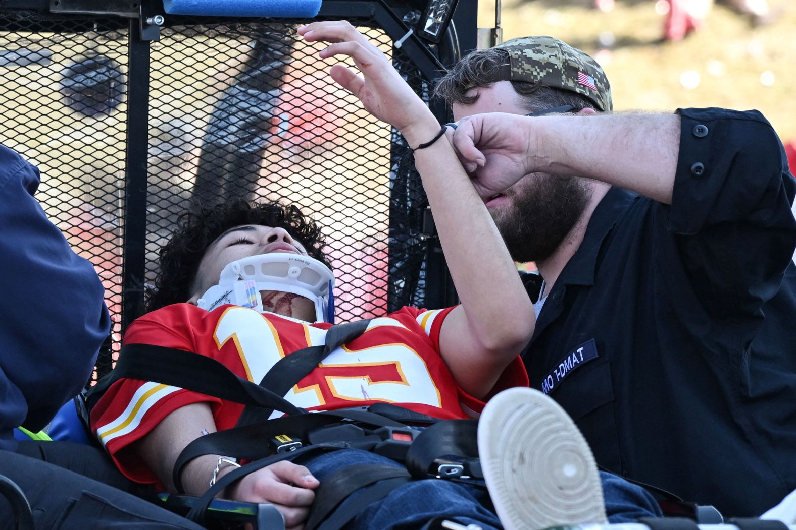 A Kansas City Chiefs fan receives medical treatment after a <a href="index.php?page=&url=http%3A%2F%2Fwww.cnn.com%2F2024%2F02%2F14%2Fus%2Fgallery%2Fkansas-city-parade-shooting%2Findex.html" target="_blank">shooting</a> that occurred right after the team's Super Bowl celebrations on Wednesday, February 14.