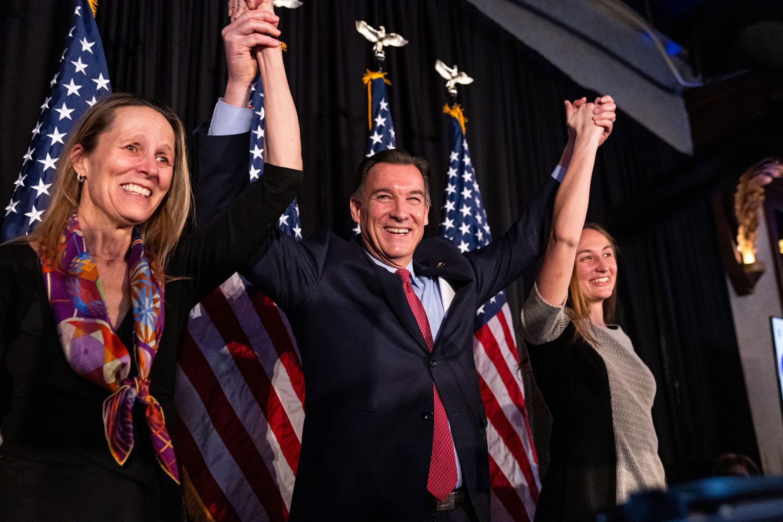 Former US Rep. Tom Suozzi appears with his wife, Helene, and his daughter, Caroline, at an election night party in Woodbury, New York, on Tuesday, February 13. Suozzi, a Democrat, <a href="index.php?page=&url=https%3A%2F%2Fwww.cnn.com%2F2024%2F02%2F13%2Fpolitics%2Fsantos-seat-tom-suozzi-mazi-pilip%2Findex.html" target="_blank">won the special election to replace disgraced Republican George Santos</a> in the House of Representatives. The result will further shrink the House GOP's narrow majority.