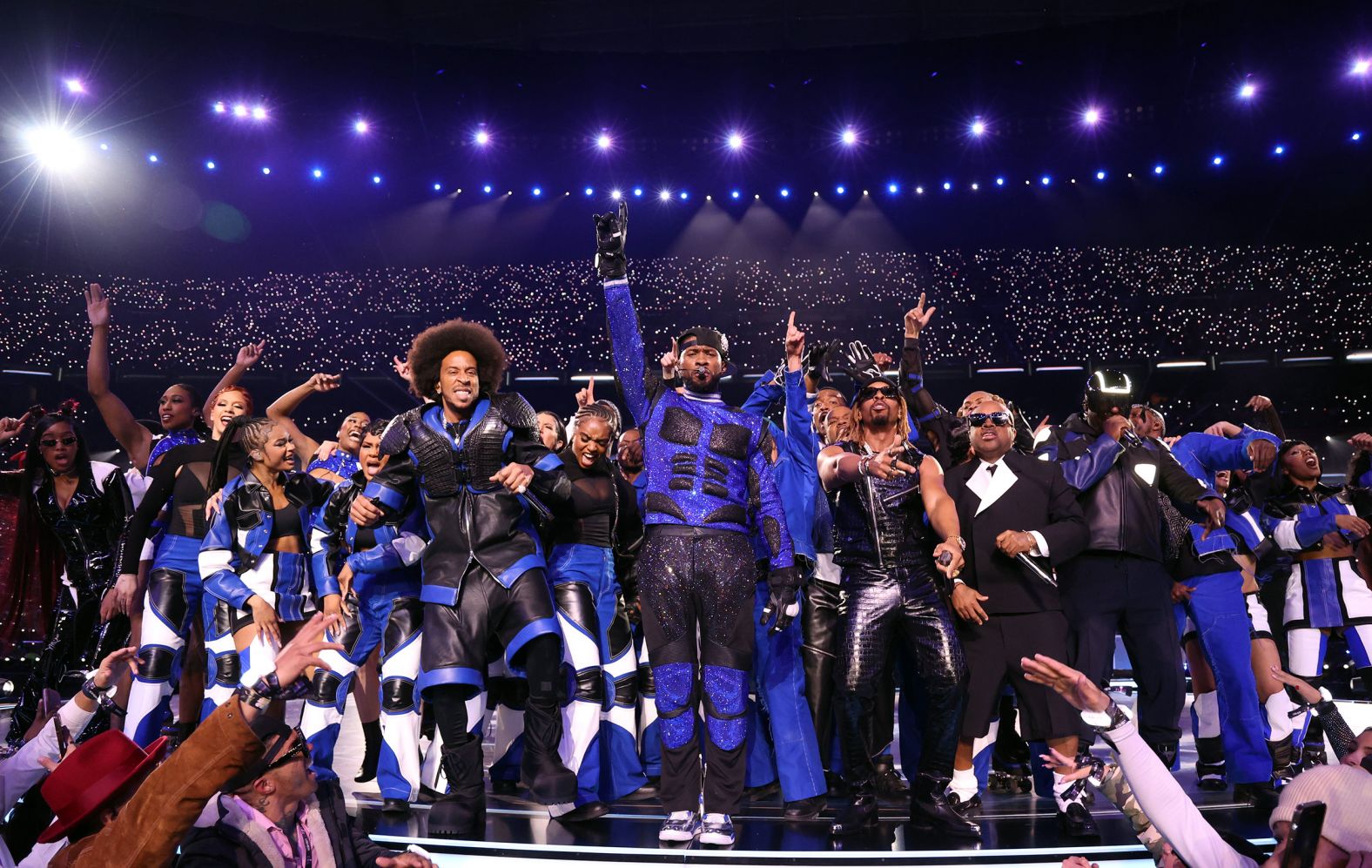 Usher, center, and his fellow performers close out the <a href="index.php?page=&url=http%3A%2F%2Fwww.cnn.com%2F2024%2F02%2F11%2Fentertainment%2Fgallery%2Fhalftime-show-super-bowl-lviii-usher%2Findex.html" target="_blank">Super Bowl halftime show</a> on Sunday, February 11. The game was held at Allegiant Stadium, just off the Las Vegas Strip.