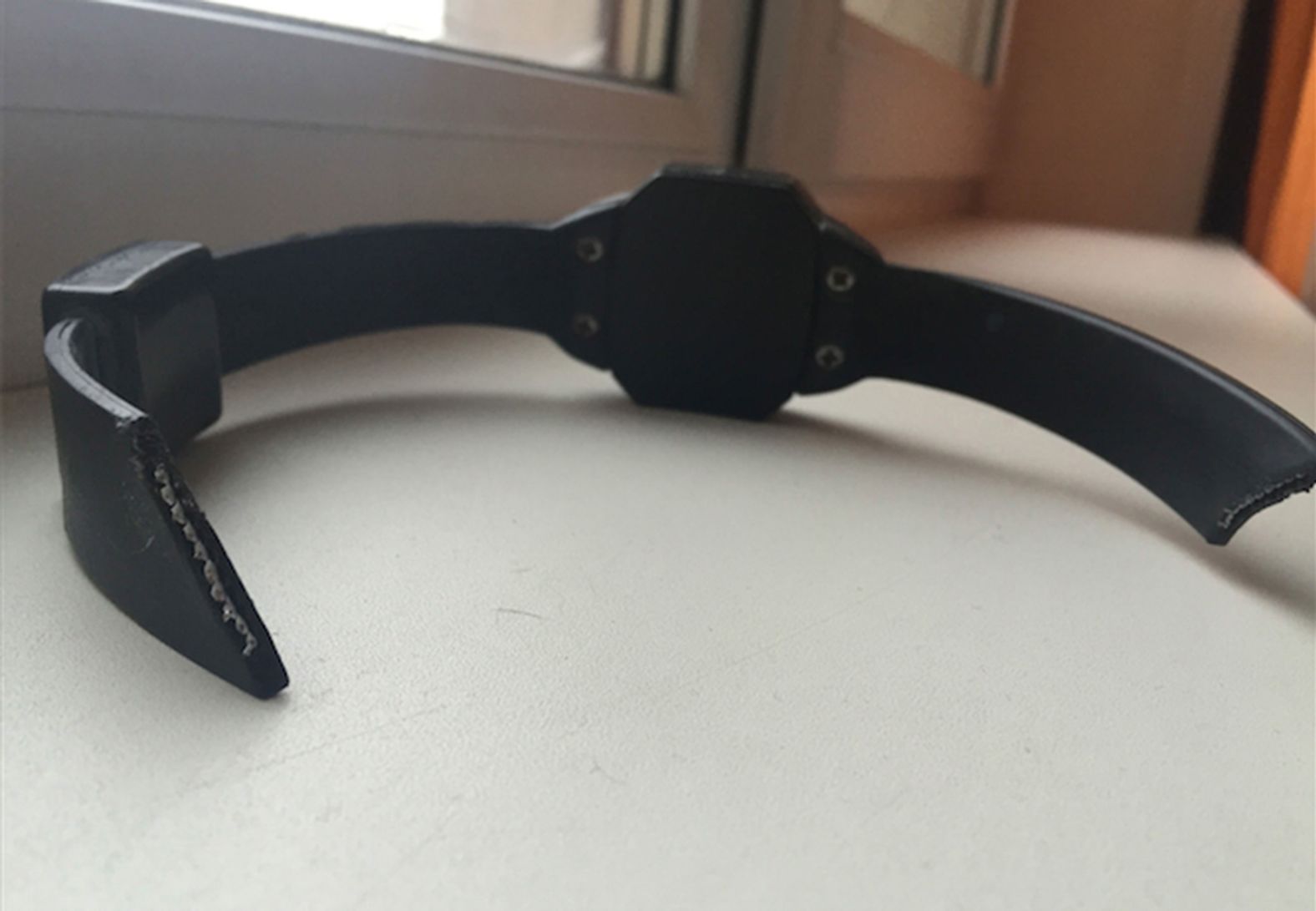 Navalny cut off this electronic bracelet during his house arrest in Moscow in January 2015. He was protesting what he called his illegal detention.