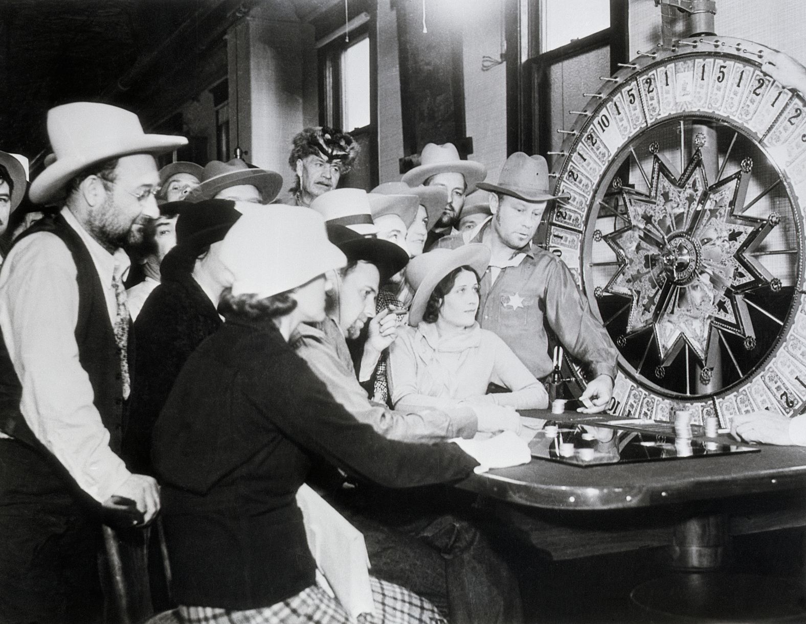 People gamble around a wheel of fortune in 1935. In 1931, Nevada became the first state in the country to legalize gambling. The idea was to help the state recover from the effects of the Great Depression.
