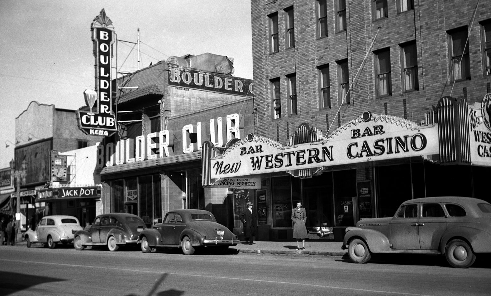 A woman stands in front of the New Western Casino and Boulder Club circa 1940. The Boulder Club was built in 1929 and received one of Las Vegas' first gambling permits. It closed in 1960.