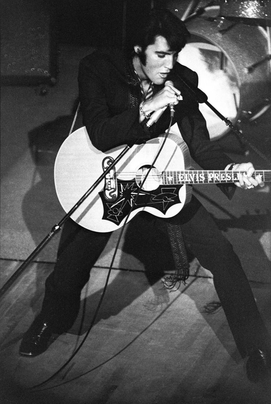 Presley performs at the International Hotel circa 1969. His return to the stage was highly anticipated after years of recording and acting in movies.