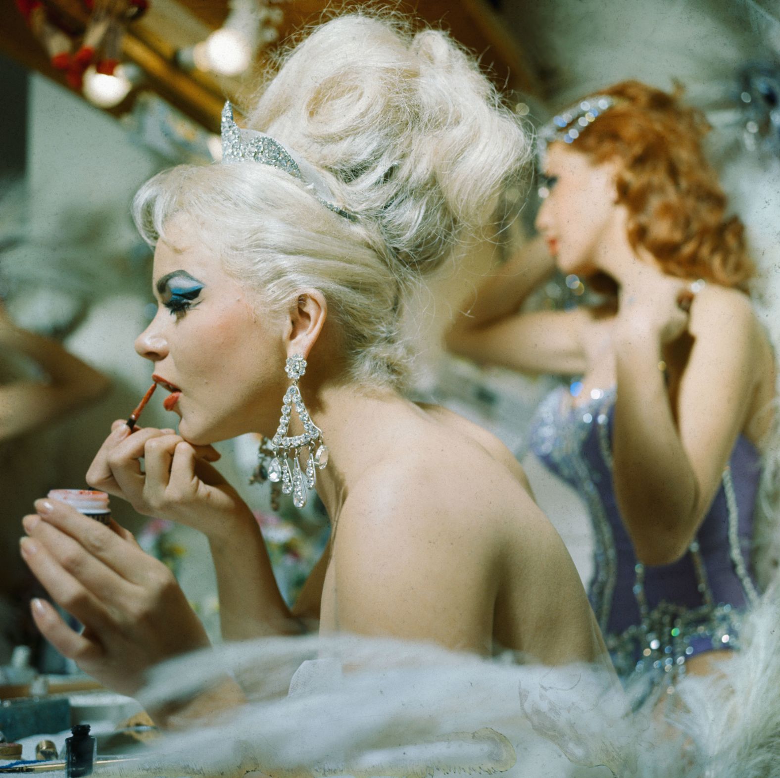 Dancers from the Hotel Tropicana get ready for a 1969 show celebrating the centennial of the original Folies Bergère, a music hall that opened in Paris in 1869.