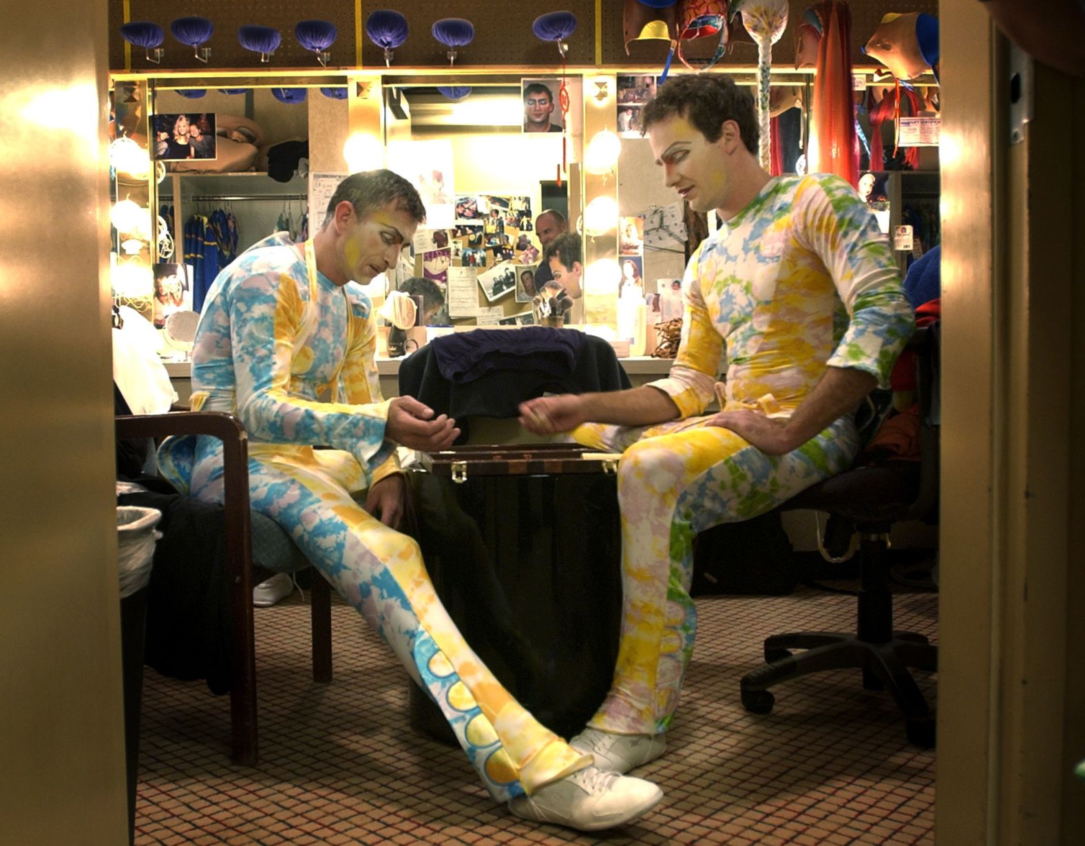 Eligiusz Skoczylas, left, and Paul Cameron — two stars of the Cirque du Soleil show "Mystère" — play backgammon backstage in 2004.