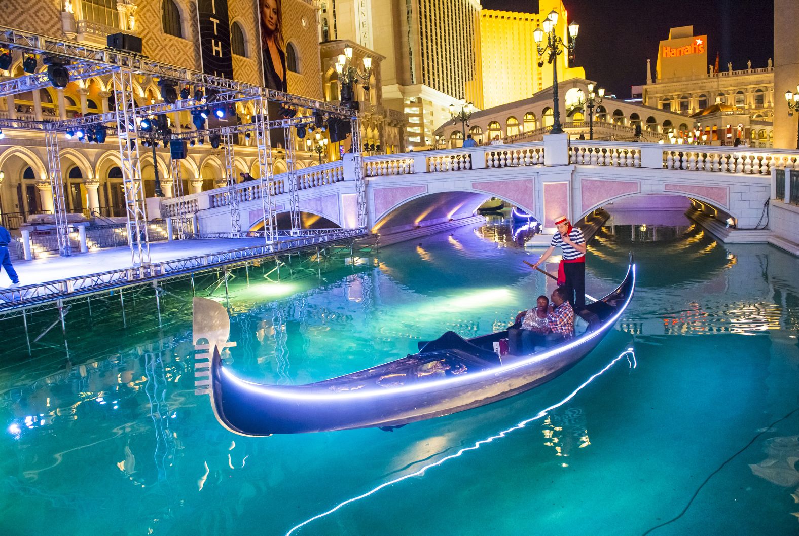 People ride a gondola at the Venetian Resort Hotel and Casino in 2012.