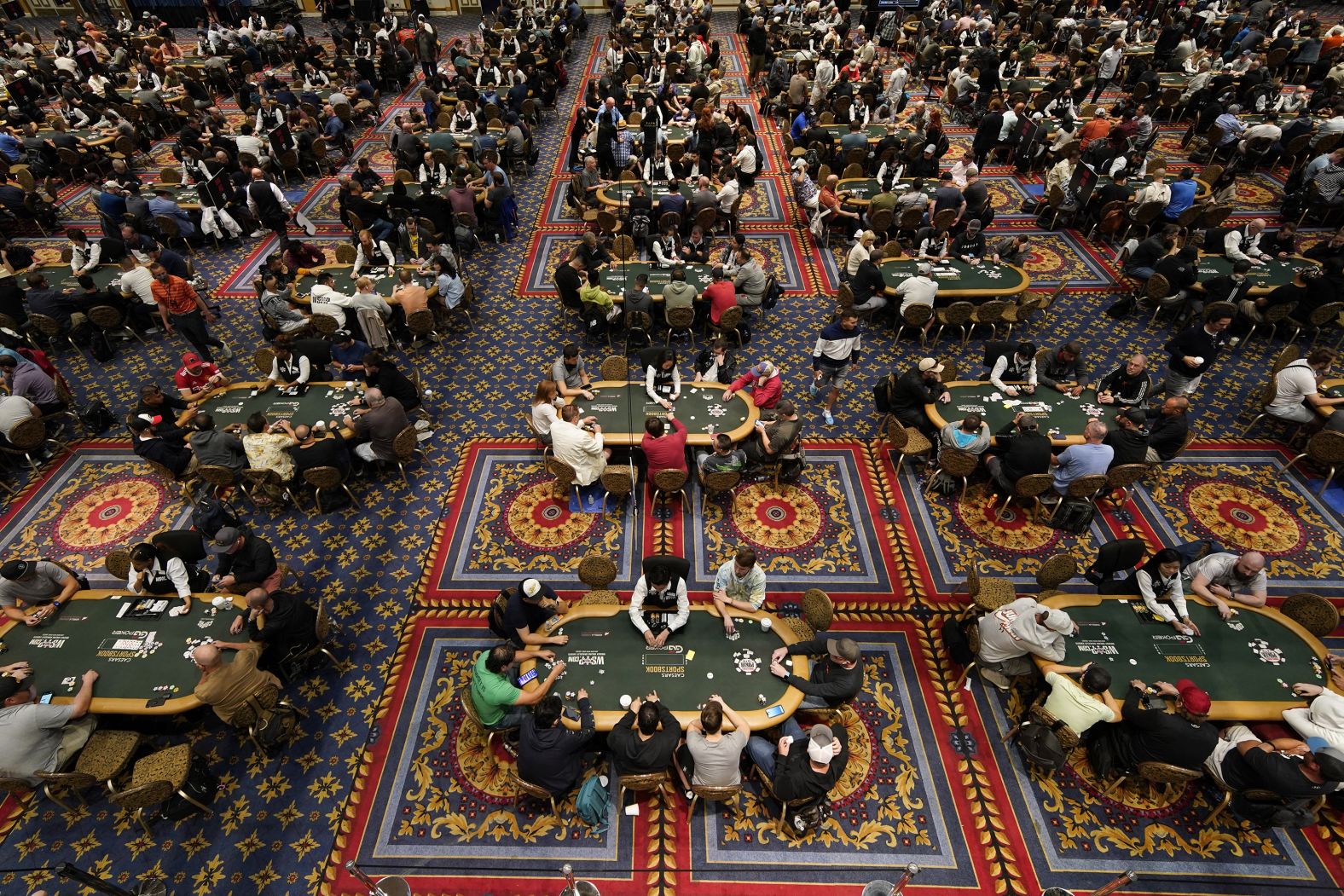 Players compete in the main event of the World Series of Poker in 2022.