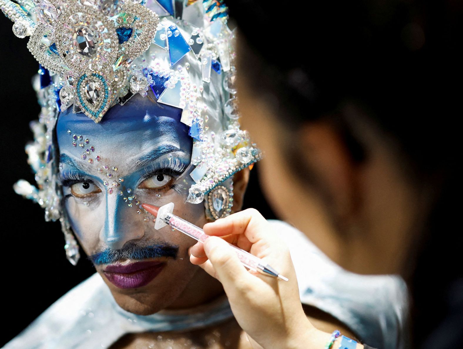 A participant prepares to take part in a drag queen competition during Carnival festivities in Las Palmas de Gran Canaria, Spain, on Friday, February 16.