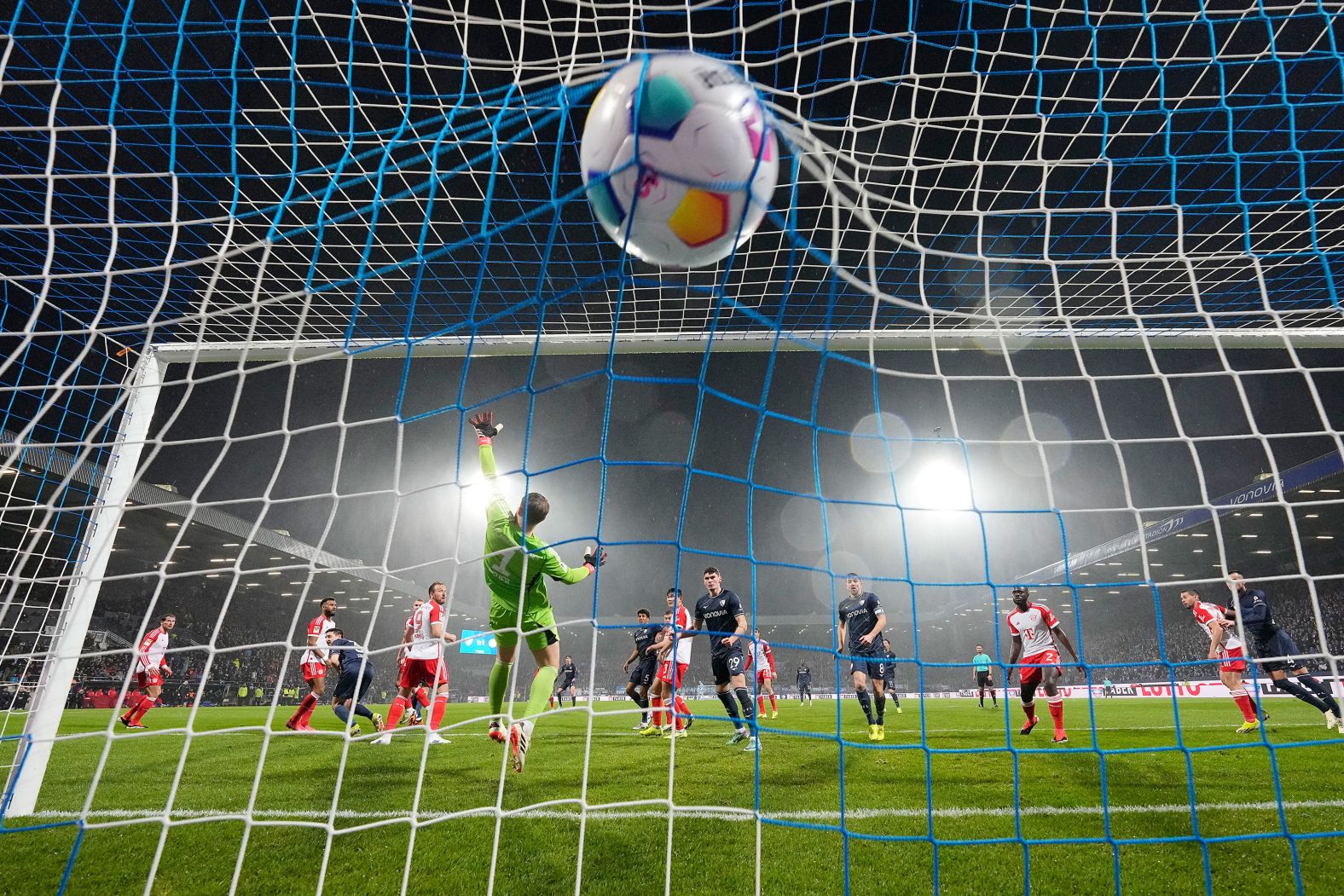 The ball flies by Bayern Munich goalkeeper Manuel Neuer during a Bundesliga match in Bochum, Germany, on Sunday, February 18. Bochum defeated Bayern 3-2.