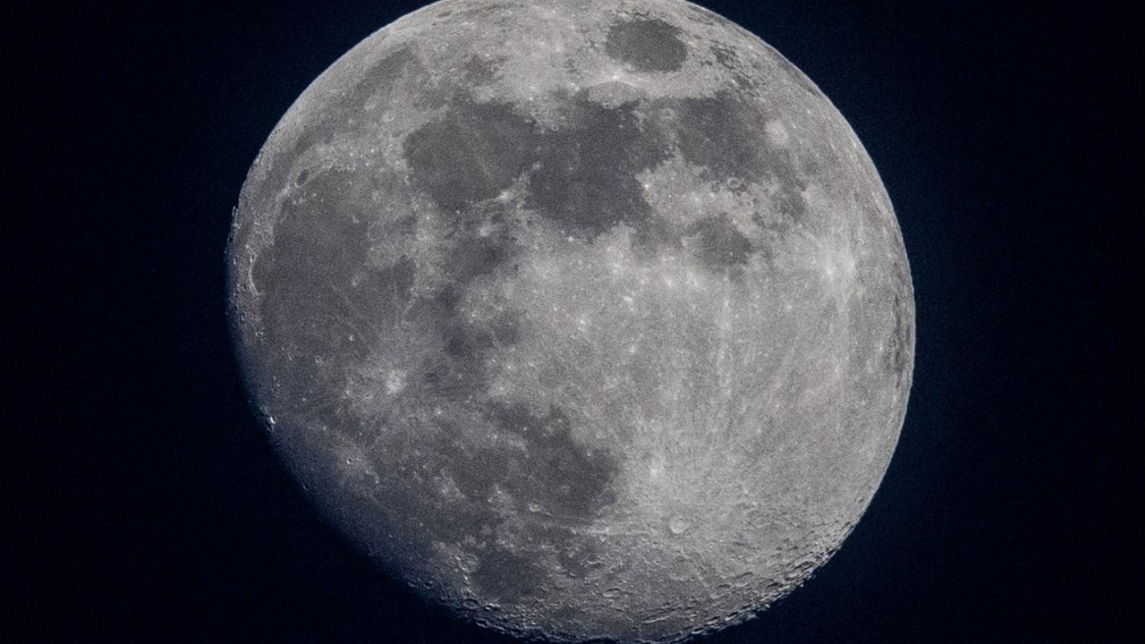 The Waxing Gibbous moon rises in the sky over Berlin's Kreuzberg district on February 21, 2024. (Photo by David GANNON / AFP) (Photo by DAVID GANNON/AFP via Getty Images)