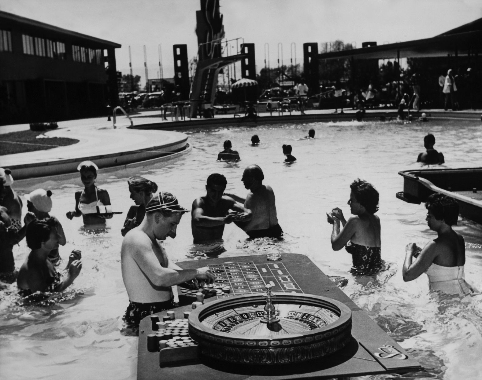 People gamble inside a Las Vegas swimming pool in 1965.