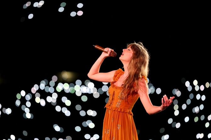 Swift performs during the "Evermore" section of the show in Sydney in February 2024. 