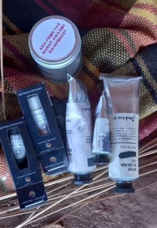 Participating artists were each given a kit of paints, ash, pastels, pigments and charcoal to create their artwork. The idea to use the charred remains of the Amazon rainforest was inspired by previous Migrate Art exhibitions, including "Scorched Earth," which featured art made from the ash of war zones in Iraqi Kurdistan.