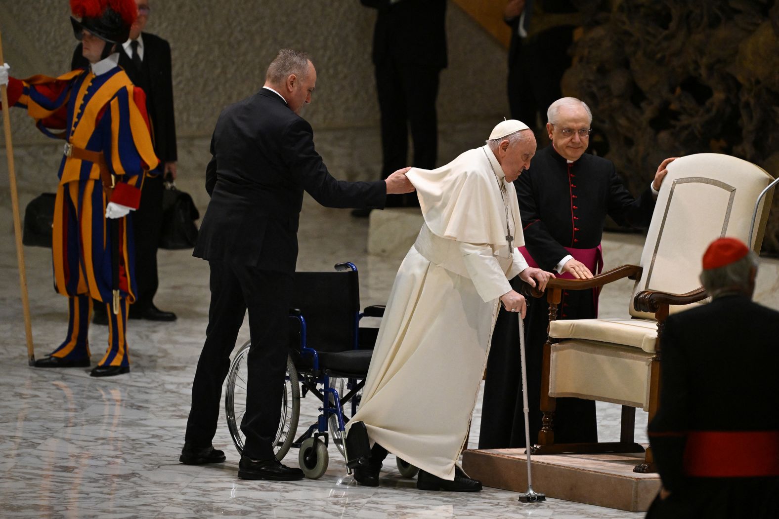 Pope Francis arrives for his weekly general audience in February 2024. He was later taken to the hospital with flu symptoms.