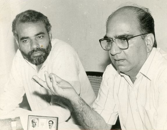 Modi worked his way through the ranks of the BJP, establishing himself as a respected politician. Here he is pictured with the party's former general secretary in 1991. 