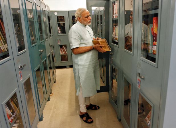 Modi governed the state of Gujarat for nearly 13 years, becoming among the BJP's most powerful politicians before setting his eyes on India's top seat. Pictured inside his residence in June 2013. 