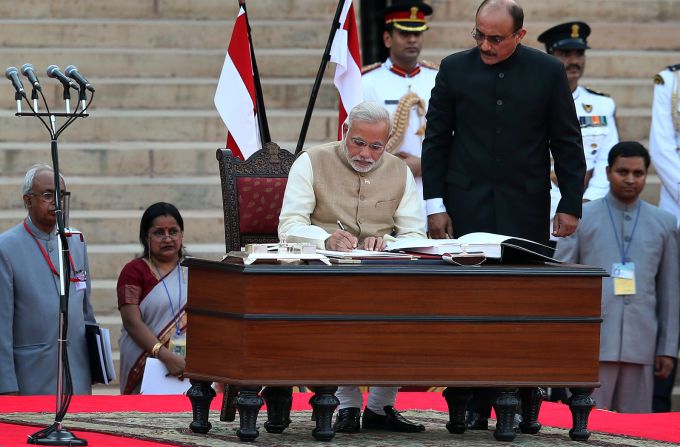 Modi, India's 14th prime minister, took oath of office at the presidential palace in New Delhi, India, on May 26, 2014. 