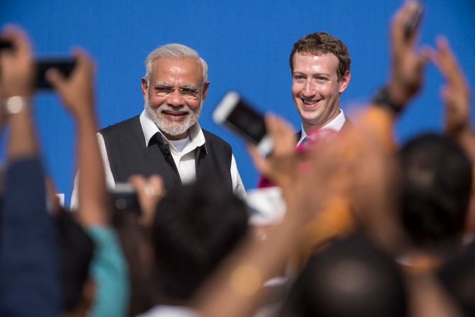 International business figures have also wooed India's leader at a time of impressive economic growth. Modi and Meta founder Mark Zuckerberg are pictured at the Facebook headquarters in Menlo Park, California, U.S., on September 27, 2015.