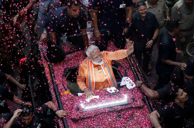 Modi won a second term in 2019, once again easily defeating India's fractured opposition. In this picture he can be seen campaigning in Varanasi, India, April 25, 2019. 