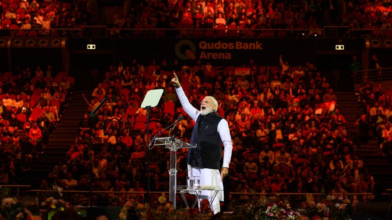 Prime Minister Narendra Modi of India speaks during a rally in Sydney, Australia, on May 23, 2023. Modi has tried to fuse his image to the economic and political power of Indians abroad. They voice both pride and worry in return.