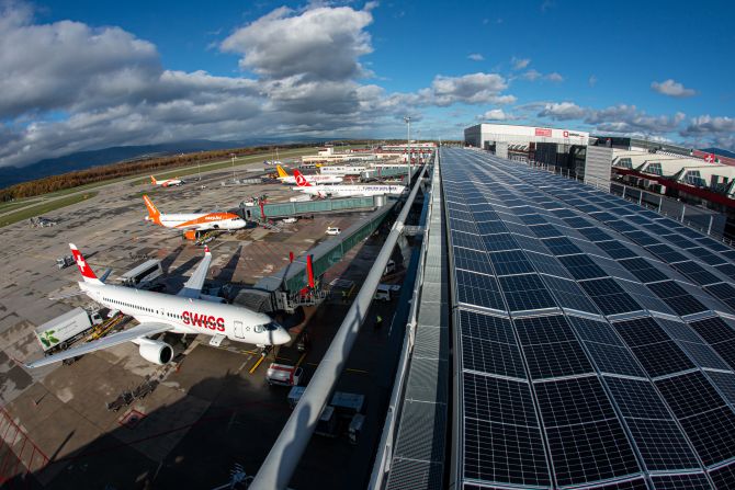 In 2022, Geneva airport commissioned and built a large-scale solar panel system on the roof of the airport's East Wing building. Over 3,700 solar panels are spread over the 520-meter length of the building, producing over 1.5 GWh of electricity per year.
