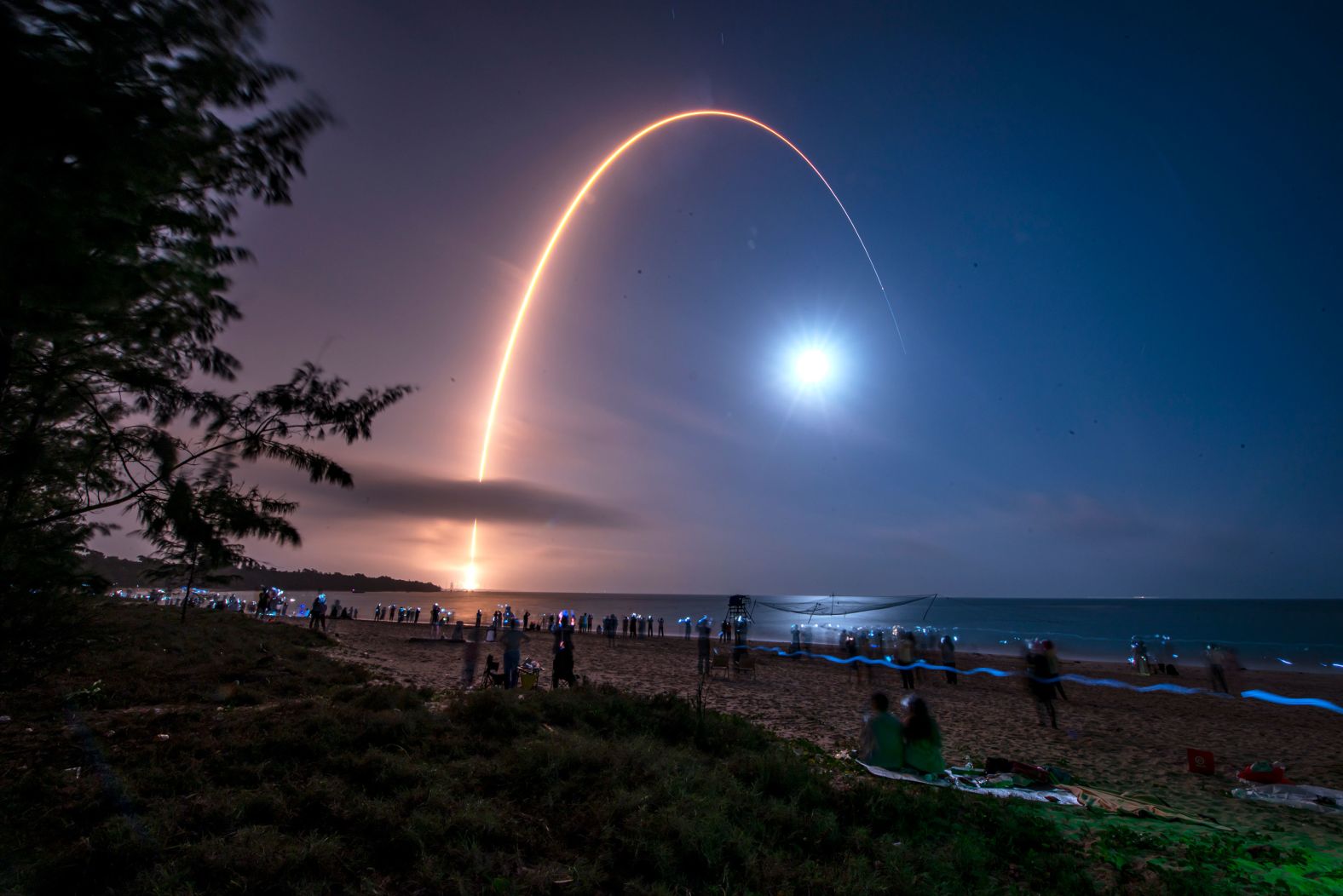 In this photo, taken with a long exposure, a rocket blasts off from Wenchang, China, on Friday, February 23. It was carrying a communication technology experiment satellite into space.