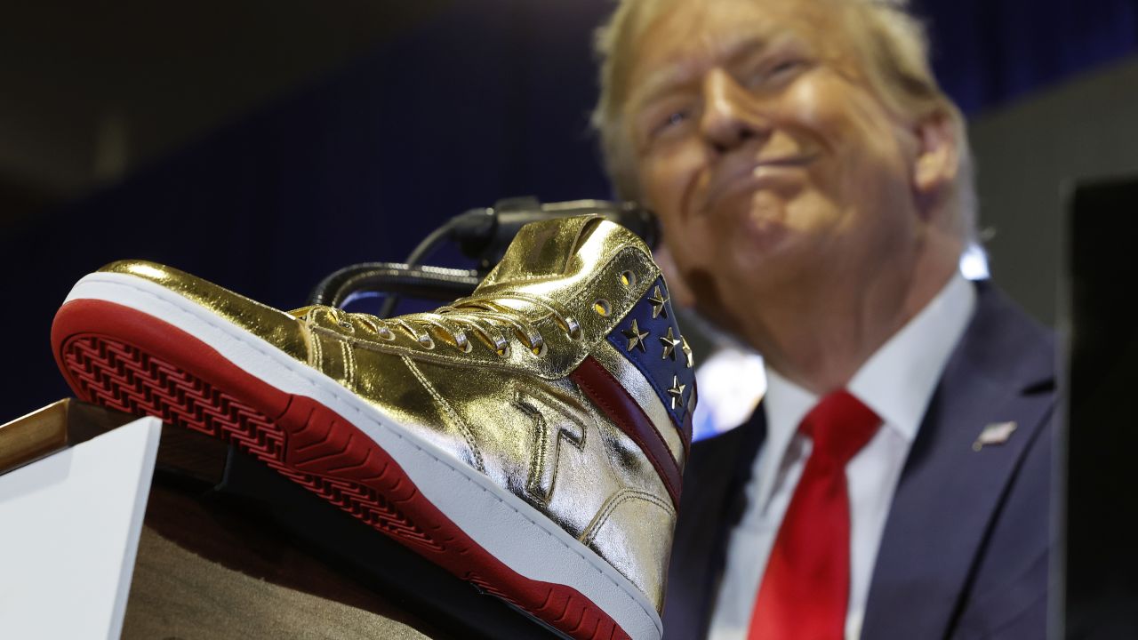 PHILADELPHIA, PENNSYLVANIA - FEBRUARY 17: Republican presidential candidate and former President Donald Trump delivers remarks while introducing a new line of signature shoes at Sneaker Con at the Philadelphia Convention Center on February 17, 2024 in Philadelphia, Pennsylvania. Sneaker Con was founded in 2009 and is one of the oldest events celebrating sneakers, streetwear and urban culture. Trump addressed the event one day after a judge ordered the former president to pay $354 million in his New York civil fraud trial. (Photo by Chip Somodevilla/Getty Images)