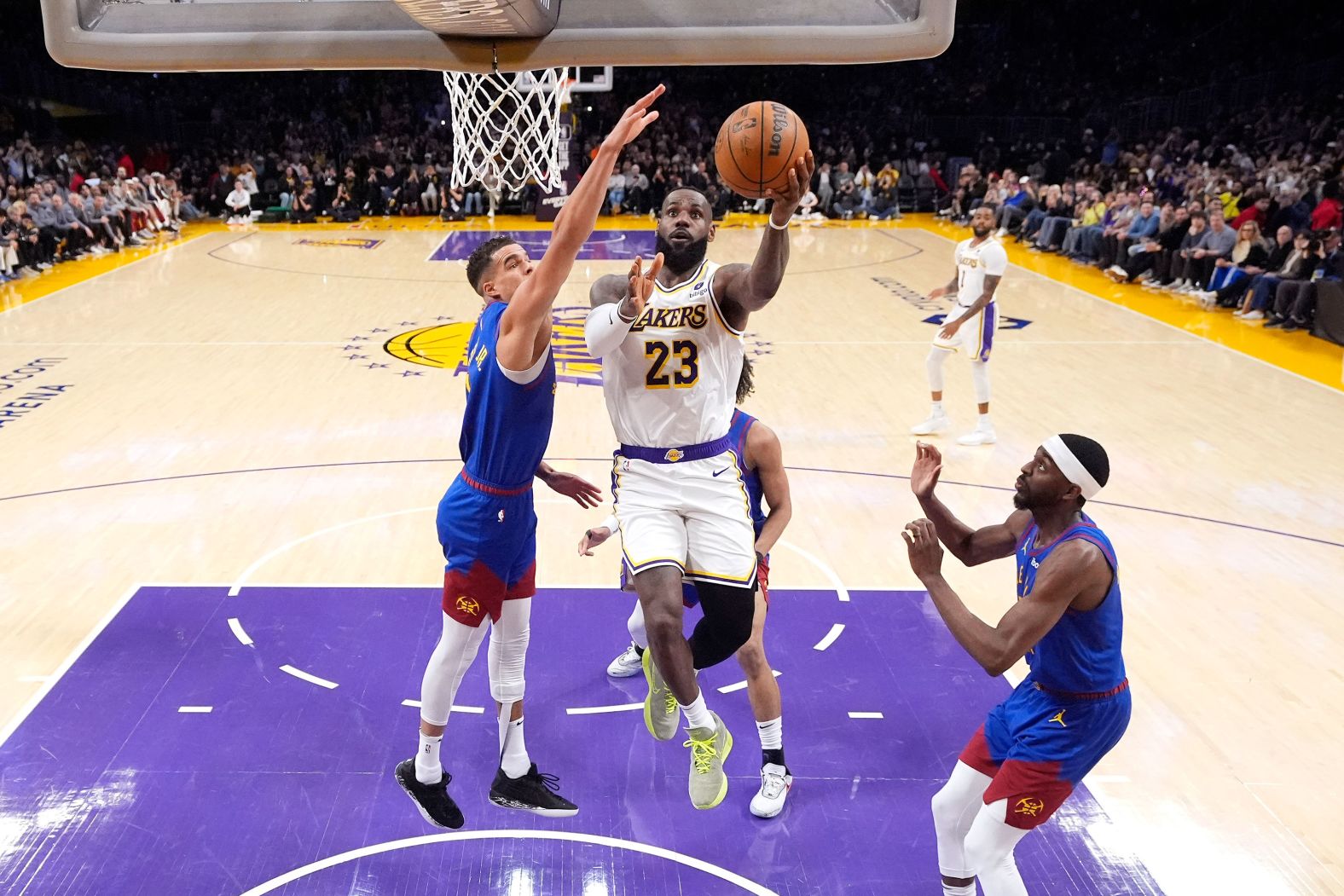 James scores his <a href="https://www.cnn.com/2024/03/02/sport/lebron-james-nba-40-000-points/index.html" target="_blank">40,000th career point</a> during a game against the Denver Nuggets on March 2, 2024. He is the first player in NBA history accomplish the milestone.