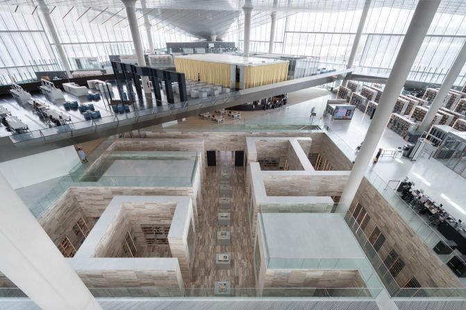 The diamond-shaped library contains rare texts and manuscripts of Arab-Islamic scholarship, some of which are on display in a subterranean section clad in stone, giving the sense they are archaeological finds.