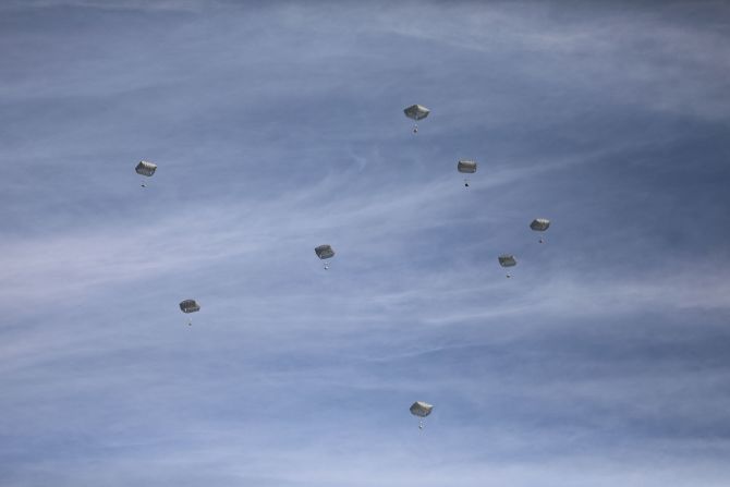 Humanitarian aid packages are dropped from the air by Jordanian army planes in Gaza City on March 1.