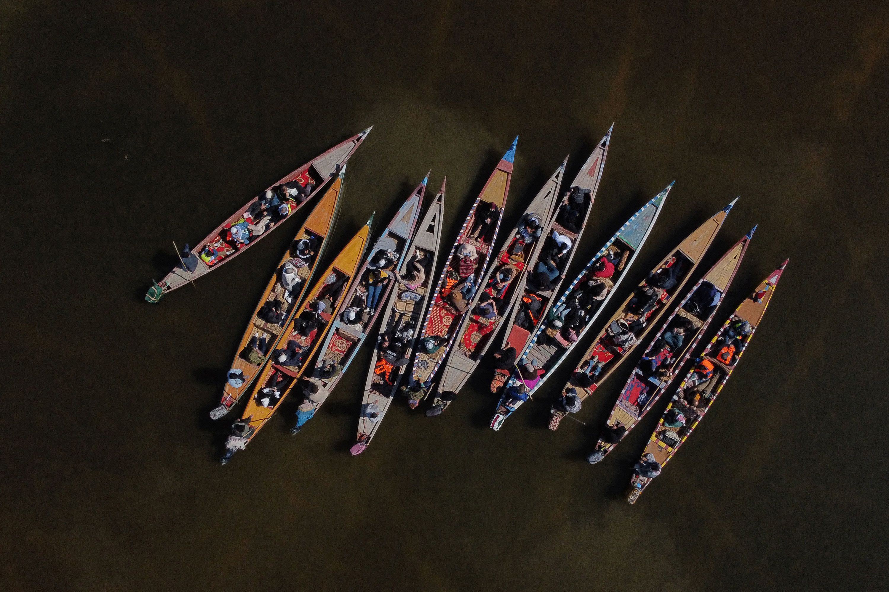 Traditional boats are bunched up in Iraq's central Mesopotamian marshes on Saturday, March 2.