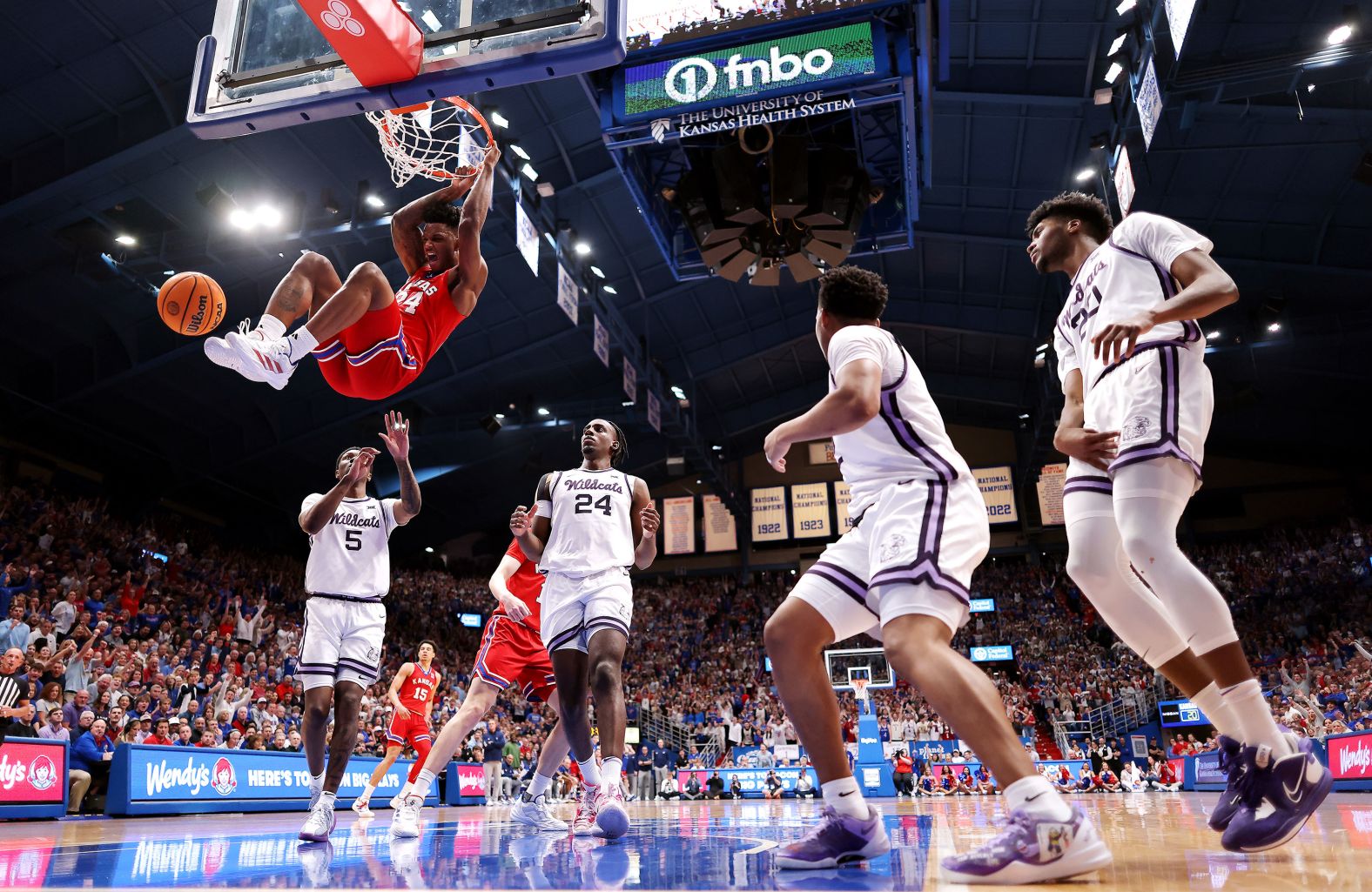 Kansas' K.J. Adams Jr. throws down a dunk during a college basketball game against Kansas State on Tuesday, March 5. Kansas won 90-68, avenging a loss to their rival earlier this season.