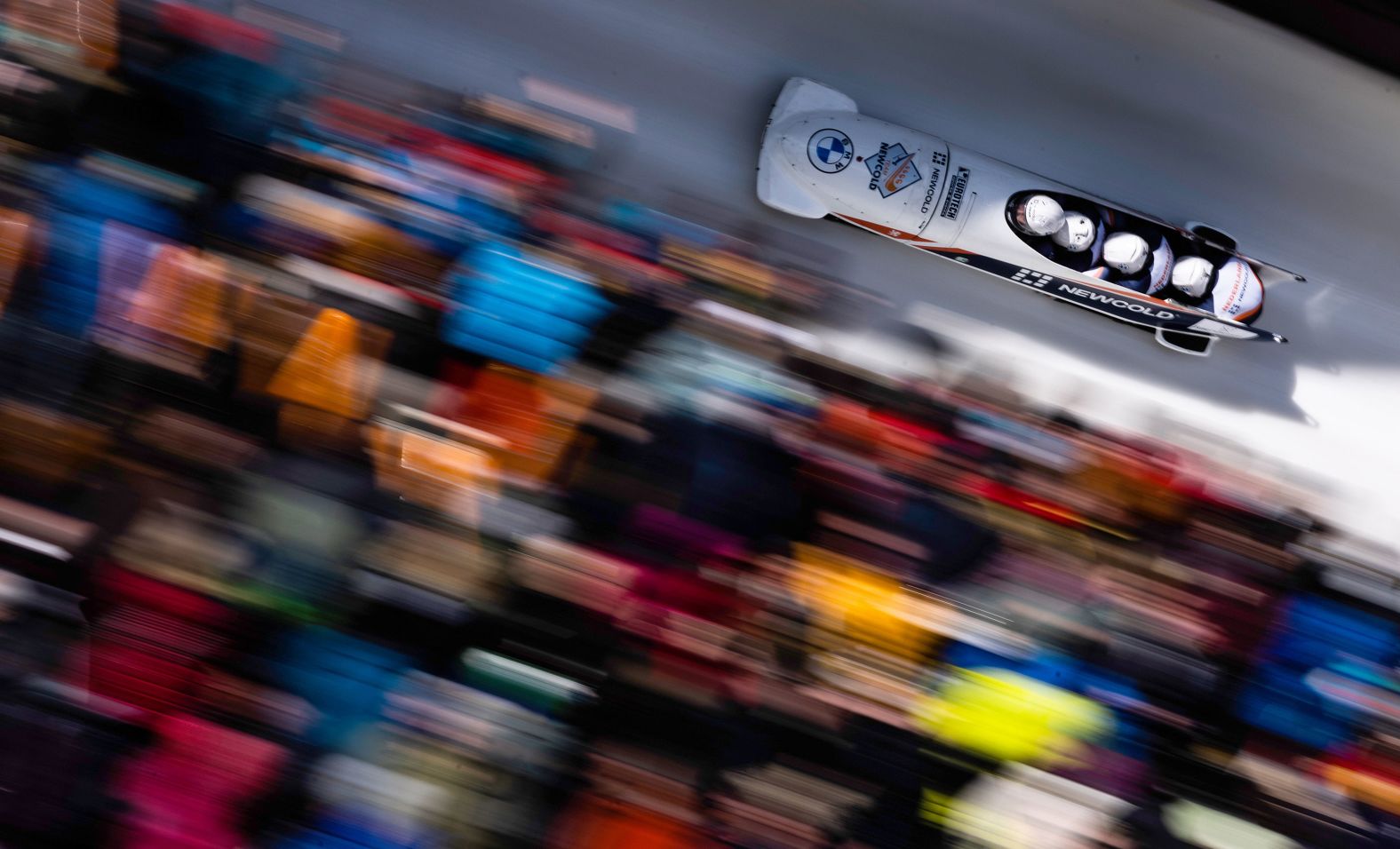 In this photo, taken with a slow shutter speed, Dutch bobsledders Dave Wesselink, Janko Franjic, Jelen Franjic and Stephan Huis compete in the IBSF World Championships on Saturday, March 2.